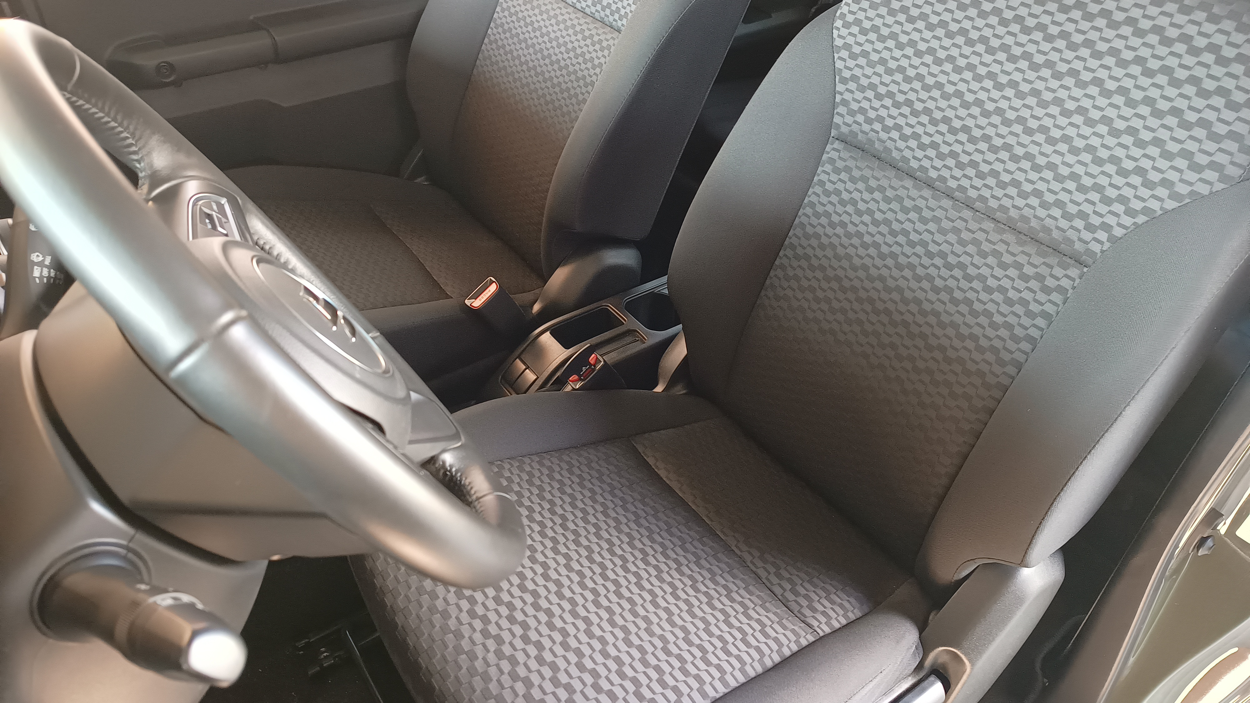 Driver seat and steering wheel